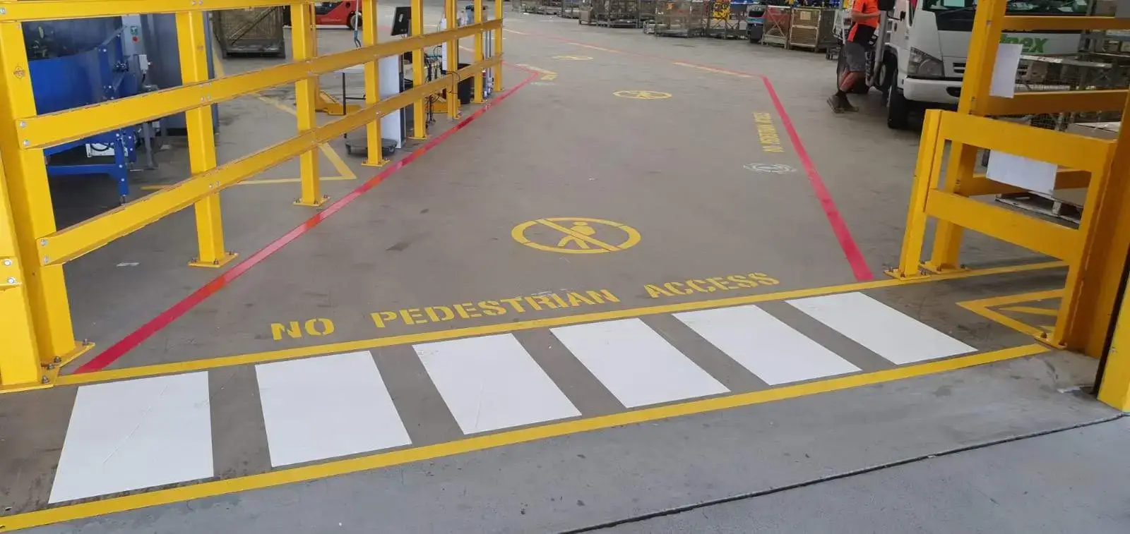 NO PEDESTRIAN ACCESS text in yellow with prohibition symbol and zebra crossing